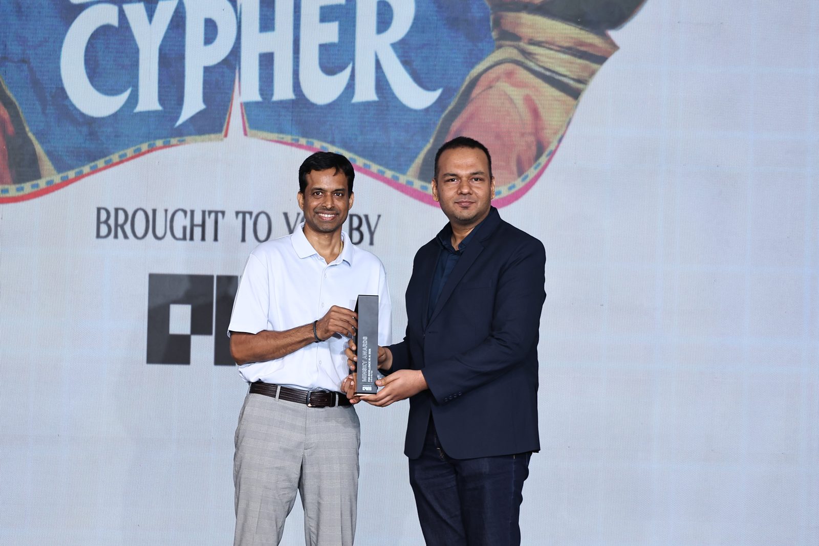 Pullela Gopichand presenting the CTO of the Year award to Dr. Vikram Singh at the Minsky Awards for Excellence in AI 2026, Cypher 2026, Bengaluru